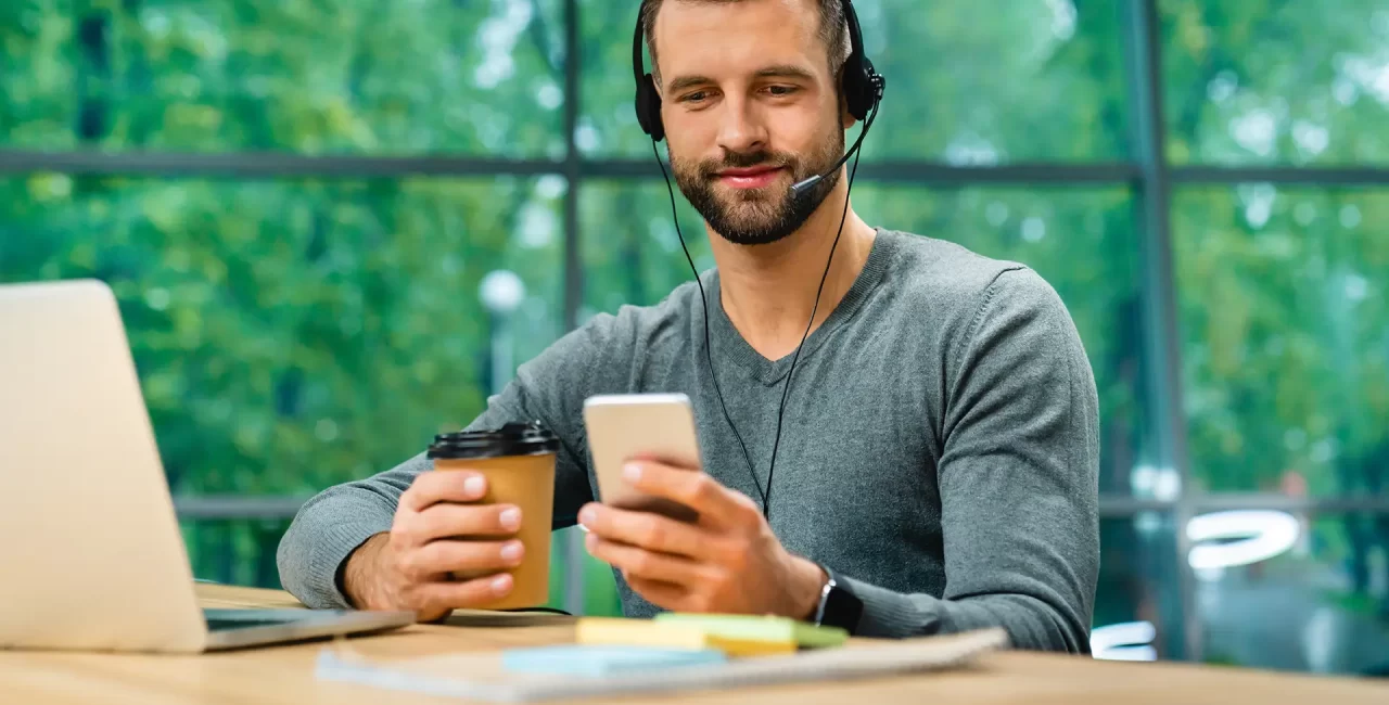 smiling-good-looking-30s-man-working-with-headset-2022-06-27-20-59-06-utc copy